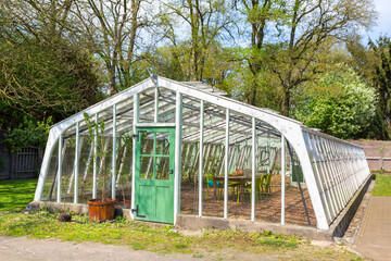 White dutch greenhouse in garden