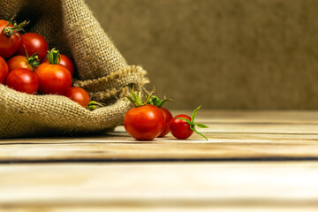 Tomatoes on wood background