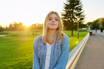 Portrait of young beautiful happy woman 19, 20 years old