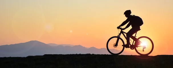  silhouette of a person riding a bike © Silhouette Media