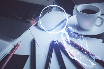 Desktop computer background in office and start up theme hologram drawing. Double exposure. Startup...