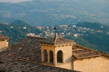 San Marino landscape. View on the hilly plain of the foothills of the Apennines and roofs of old houses from the mountain Monte Titano, old city of republic of San Marino.
