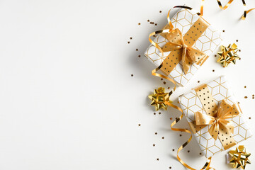 Christmas banner mockup. Background Xmas design of luxury gift boxes, sparkling confetti stars,...