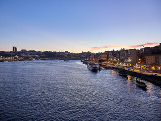 Obraz premium Porto, Portugal - August 23 2020 : Porto, Portugal old town skyline on the Douro River.