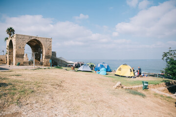 ancient building and tent looking to the see israel 