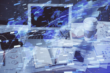 Fototapeta premium Double exposure of laptop computer and technology theme hologram. Concept of freelance work.