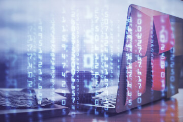 Double exposure of laptop computer and technology theme hologram. Concept of freelance work.