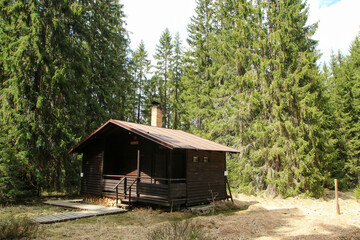 The wooden cottage hidden deep in the woods of the Czech national protected area called Šumava. Used by the local scouts or foresters. 