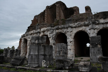 Fototapeta premium Roman amphitheater, ancient ruins, view of the city of Santa Maria Capua Vetere. Italy. Rainy day.