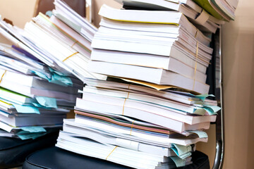 Stack of old documents report about research education document teacher while waiting approve from advisor, Annual Reports document for evaluation in student study