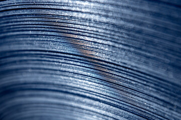 Curved lines of rolled metal are made of sheet steel.