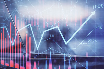 Forex graph hologram on table with computer background. Multi exposure. Concept of financial markets.