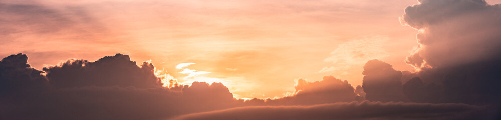 Beautiful panorama of sunset in the clouds