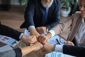 Business people teamwork stacking hand together concept.