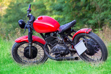 Custom red motorcycle with black beaver