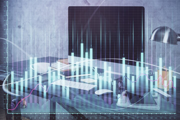 Financial market graph hologram and personal computer on background. Double exposure. Concept of forex.