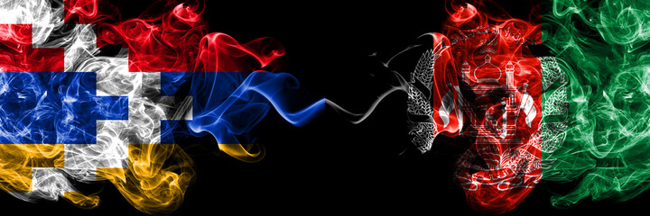 Nagorno-Karabakh, Artsakh vs Afghanistan, Afghani smoky mystic flags placed side by side. Thick colored silky abstract smoke flags