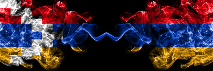 Nagorno-Karabakh, Artsakh vs Armenia, Armenian smoky mystic flags placed side by side. Thick colored silky abstract smoke flags