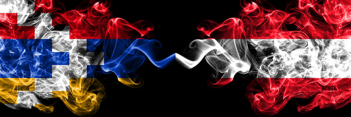 Nagorno-Karabakh, Artsakh vs Austria, Austrian smoky mystic flags placed side by side. Thick colored silky abstract smoke flags