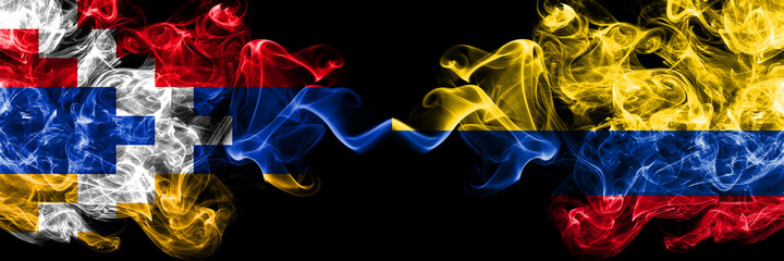 Nagorno-Karabakh, Artsakh vs Colombia, Colombian smoky mystic flags placed side by side. Thick colored silky abstract smoke flags