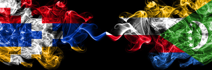 Nagorno-Karabakh, Artsakh vs Comoros, Comorian smoky mystic flags placed side by side. Thick colored silky abstract smoke flags