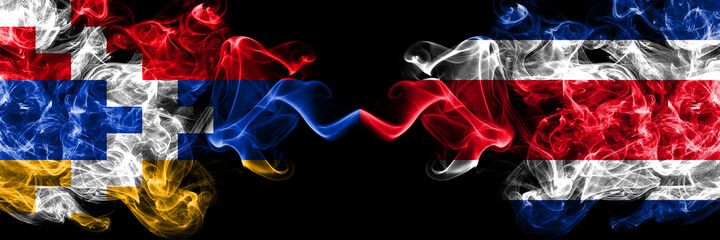 Nagorno-Karabakh, Artsakh vs Costa Rica smoky mystic flags placed side by side. Thick colored silky abstract smoke flags