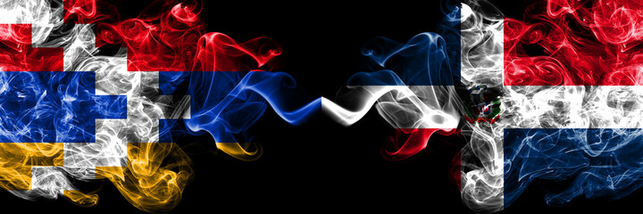 Nagorno-Karabakh, Artsakh vs Dominican Republic smoky mystic flags placed side by side. Thick colored silky abstract smoke flags