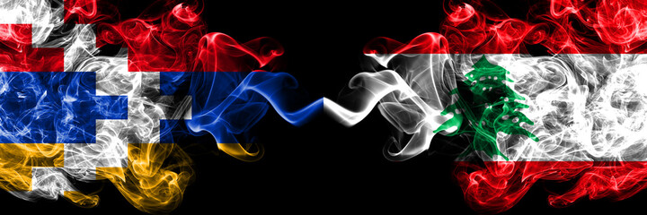Nagorno-Karabakh, Artsakh vs Lebanon, Lebanese smoky mystic flags placed side by side. Thick colored silky abstract smoke flags