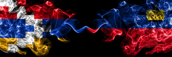 Nagorno-Karabakh, Artsakh vs Liechtenstein, Liechtensteins smoky mystic flags placed side by side. Thick colored silky abstract smoke flags