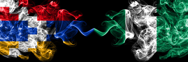 Nagorno-Karabakh, Artsakh vs Nigeria, Nigerian smoky mystic flags placed side by side. Thick colored silky abstract smoke flags