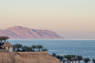 Mountain landscape of Tiran island in the Red Sea at sunset