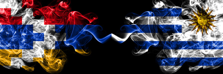 Nagorno-Karabakh, Artsakh vs Uruguay, Uruguayan smoky mystic flags placed side by side. Thick colored silky abstract smoke flags