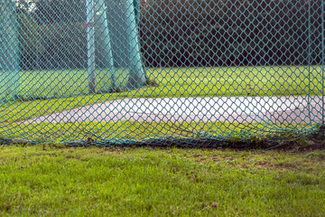 Empty disk throwing training arena in nature. 