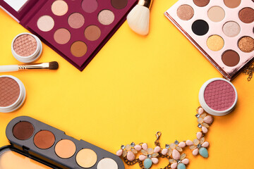 Professional cosmetics palette with eyeshadow makeup brushes cropped look