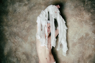 Halloween and the mummy. Young attractive guy.