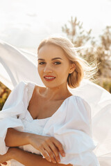Beautiful woman in white dress