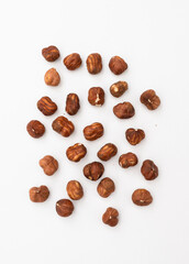 Peeled Hazelnuts on white background