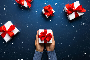 Merry Christmas and Happy Holidays greeting card, frame, banner. New Year. Noel. Christmas gifts on...