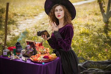 Wizard cosplay. Ideas for Halloween party, concept of autumn holidays, Woman in witch costumes,...