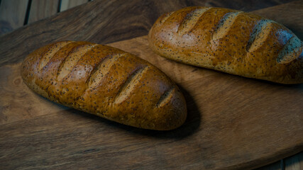 freshly baked loaf with poppy seeds