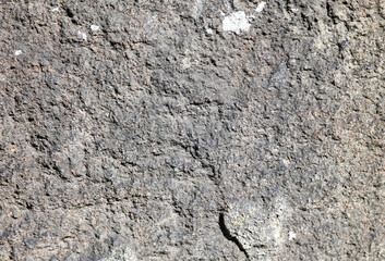 Stone rock in the mountains as an abstract background.