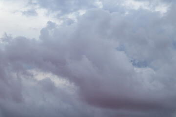 Grey purple high layered grey epic clouds on sky. Heaven cloudscape air view