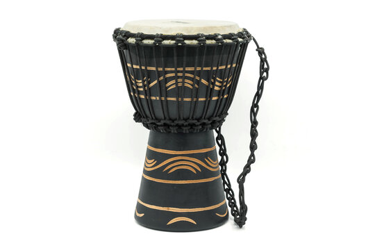 A complete black musical djembe conga drum isolated on a white background.