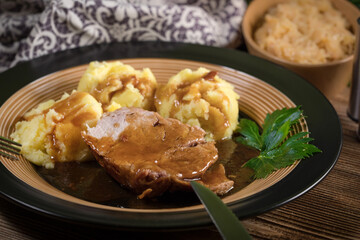 Braised pork neck in own sauce. Shallow depth of field.