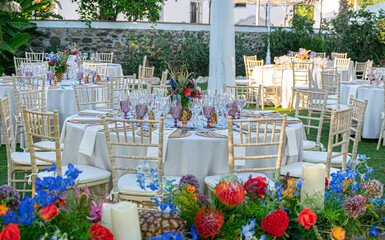 Beautiful decoration for an event or wedding with colorful flowers and table settings