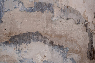 Old gray wall background. peeling paint. photo