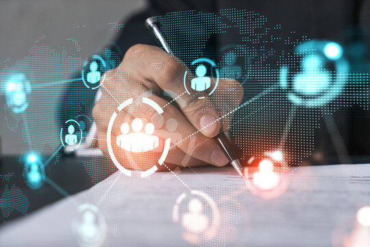 Businessman in suit signs contract. Double exposure with social media and planet hologram. Man signing agreement on research. People network concept.