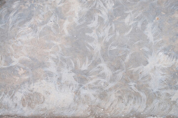 The surface of the cement floor with traces of sanding.
