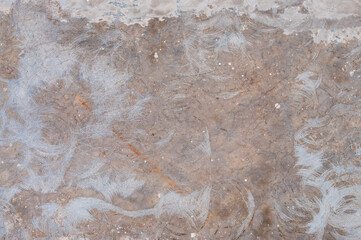 The surface of the cement floor with traces of sanding.