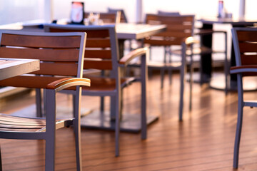 wooden chair cafe restaurant wooden deck Balconies on a back of Cruise ship